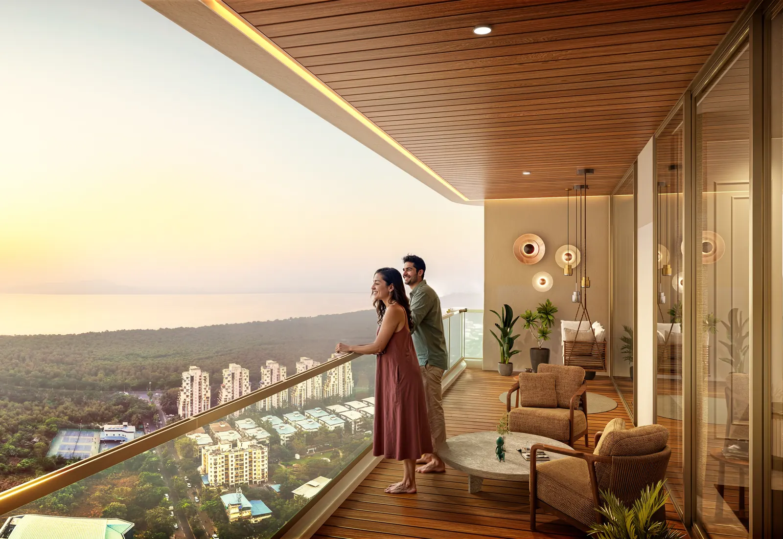 A private balcony at Sai Palm View looking out over the water at sunrise